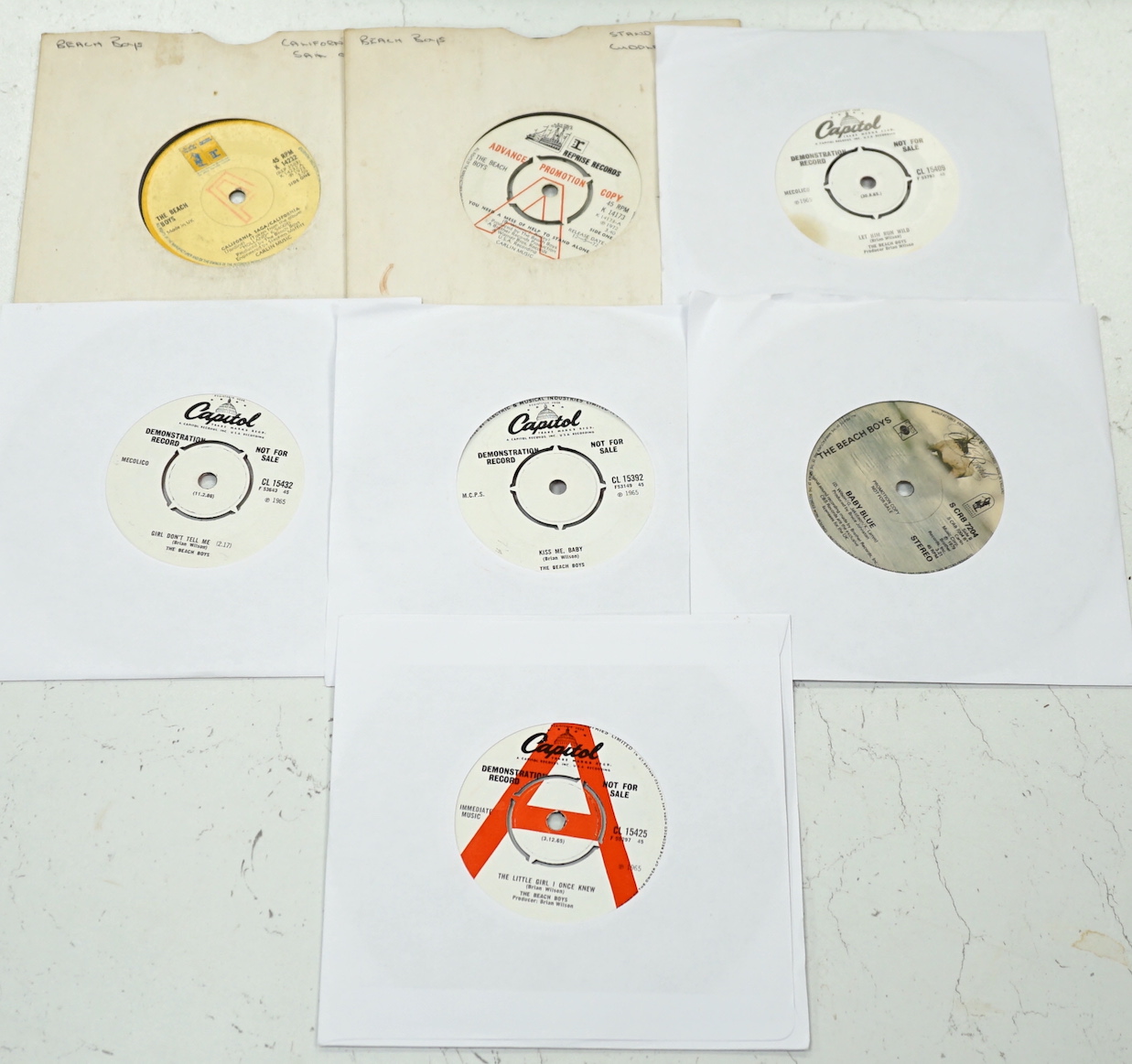 Seven The Beach Boys 7” demonstration singles on Capitol and Cowboy Records labels, all with printed demo labels, four with printed release dates